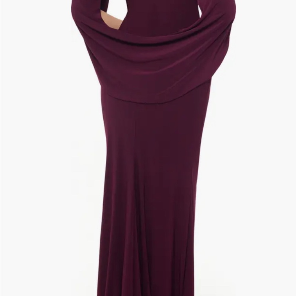 Wine Cape Long Sleeve Trumpet Gown
Betsy & Adam - Picture 4 of 7